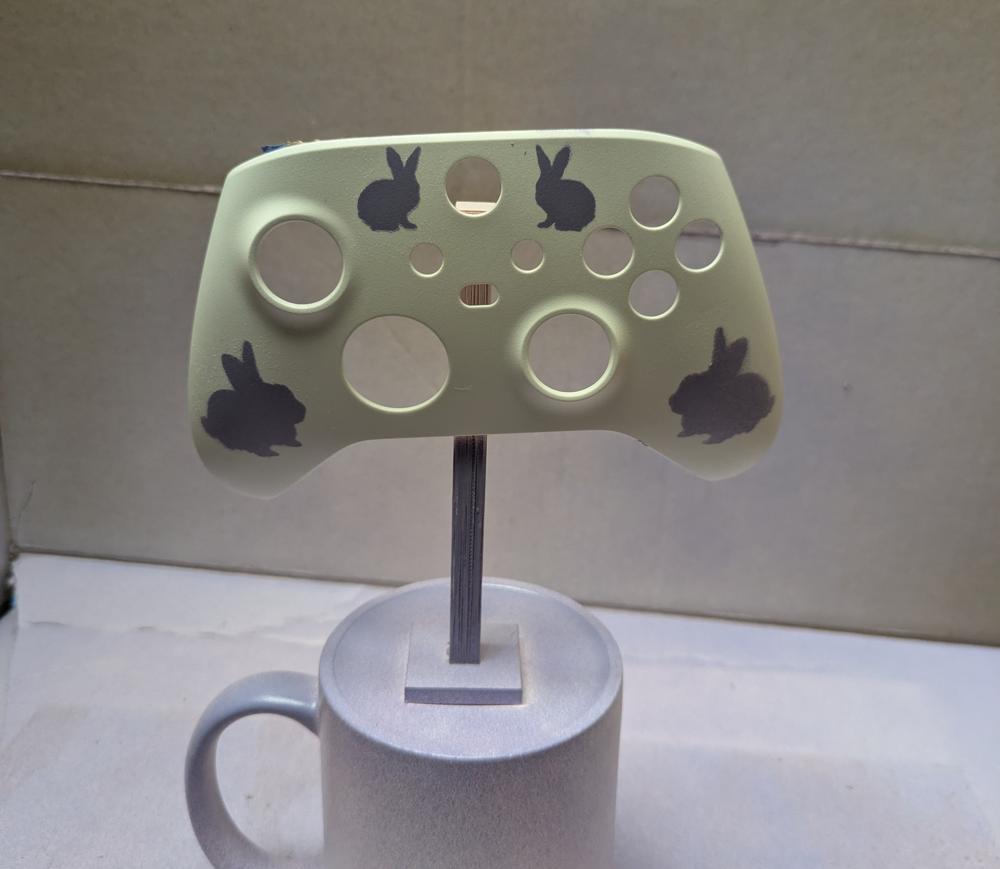 Test controller, with 4 bunny silhouettes painted on