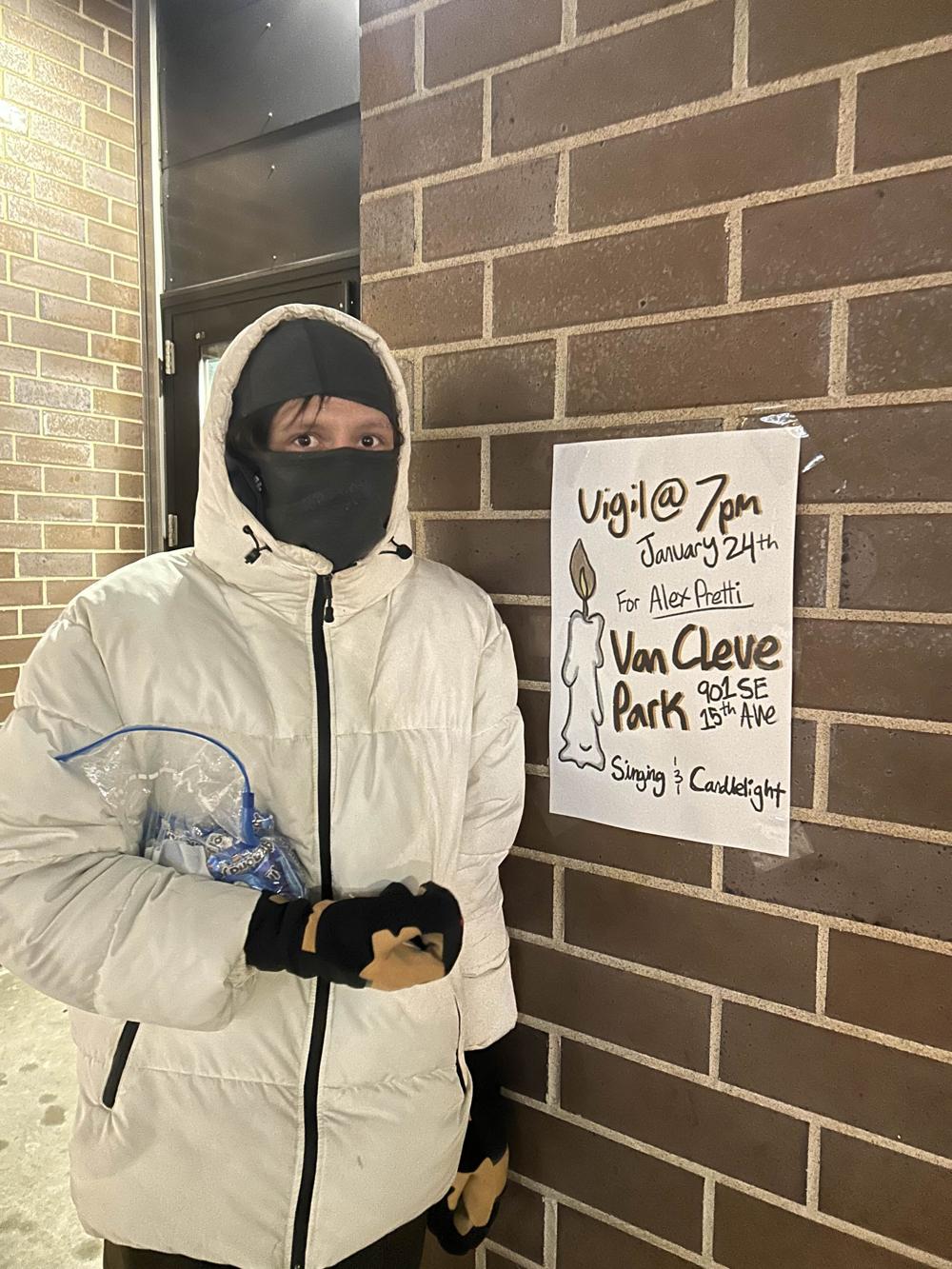 Me standing next to a poster that is advertising an event