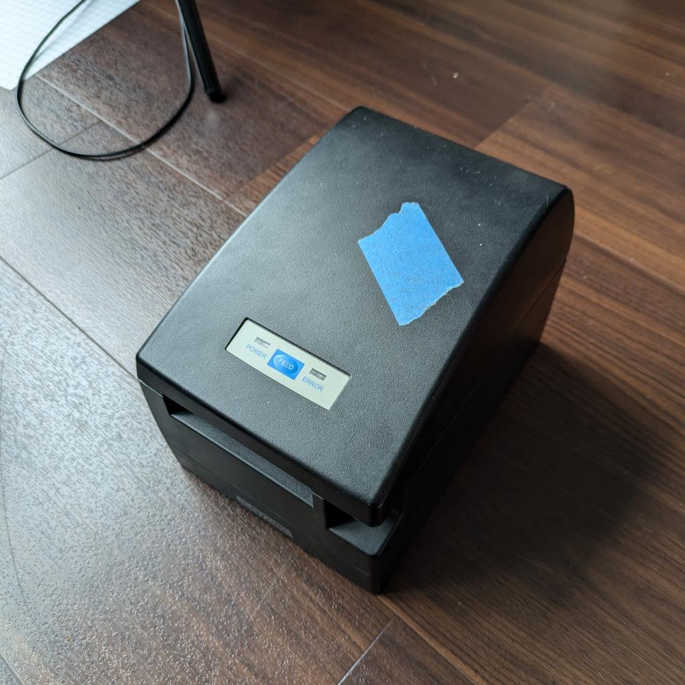 Receipt printer with a curved top