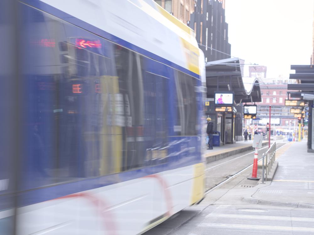 Light rail arriving with motion blur
