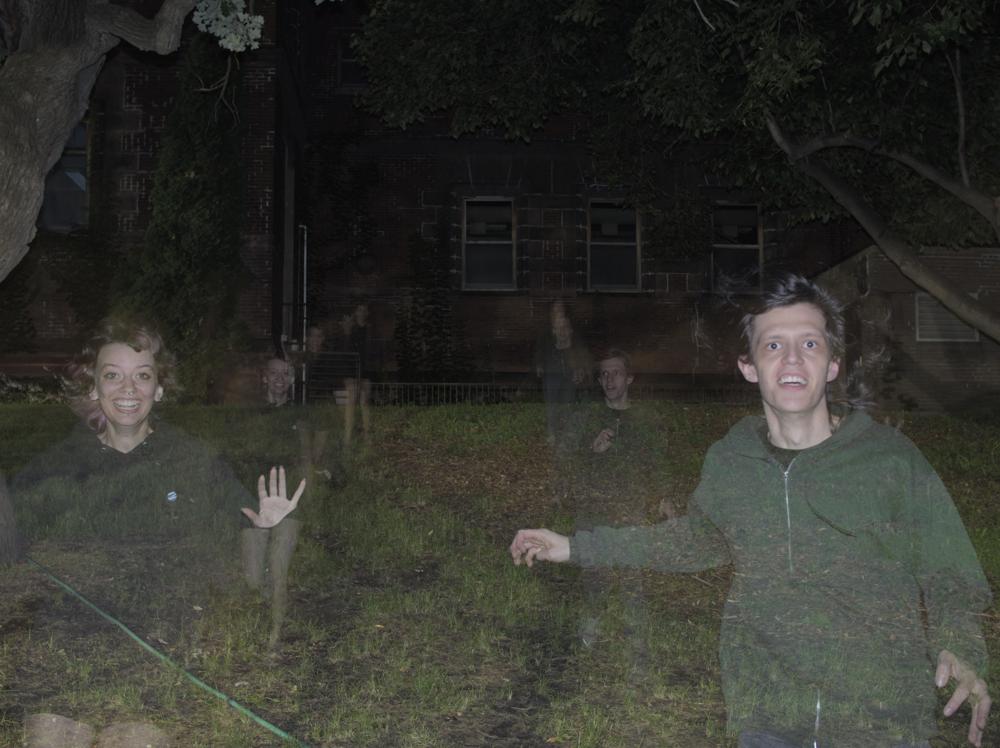 an image with multiple semi-transparent figures running in a single exposure