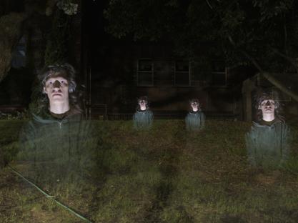 An image with multiple semi-transparent figures with only an upper body and head