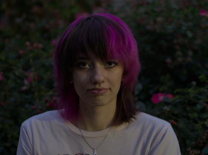 My partner who is a very cool looking person in a night time scene